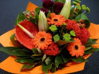 Bright and Bold Handtied - Vibrant Handtied of mixed flowers arranged by the florist.